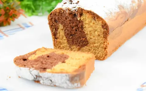 Babka piaskowa Ani gotuje – puszysty, marmurkowy wypiek z cukrem pudrem, idealny na deser.